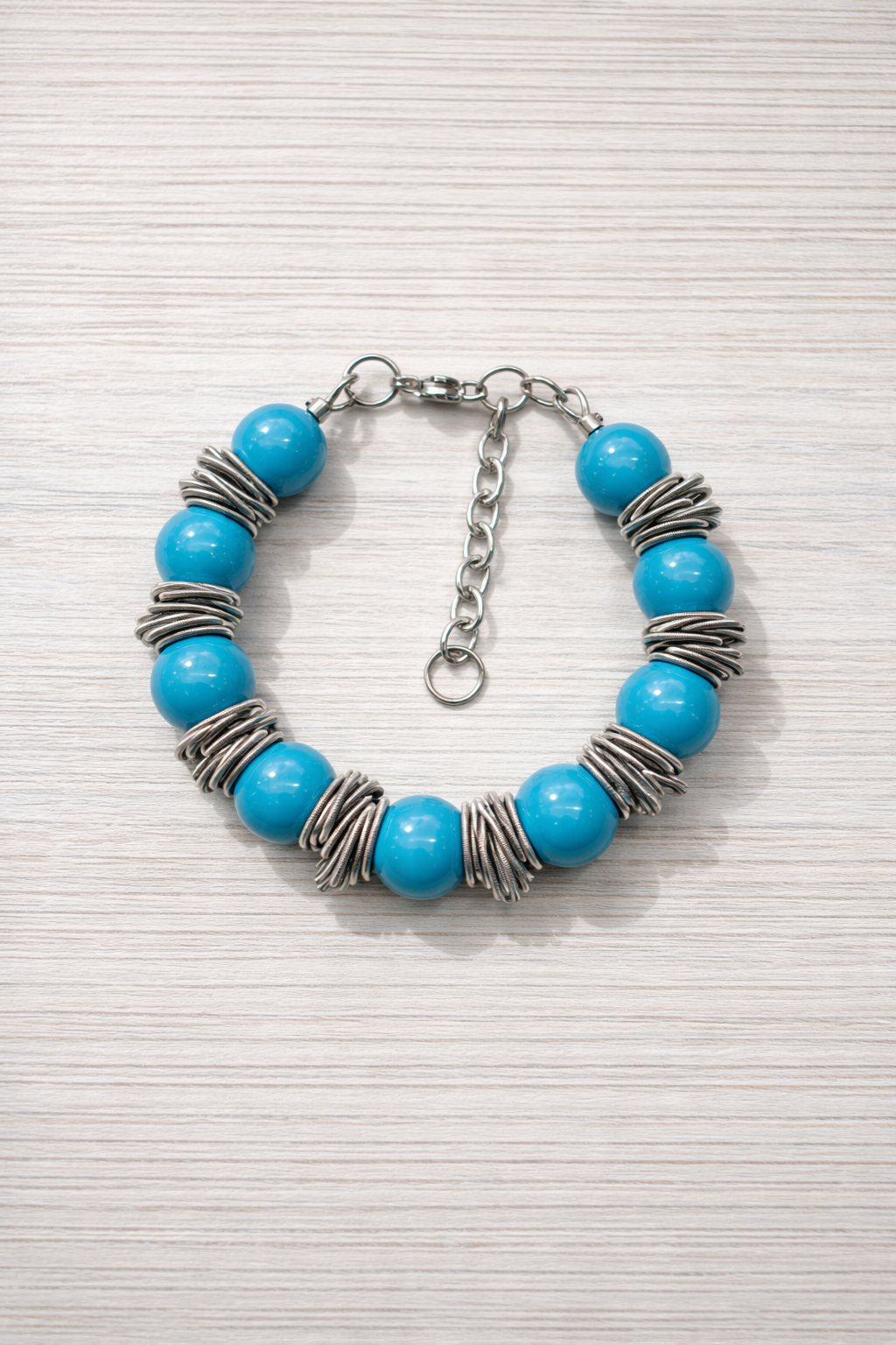 Braccialetto Ø12 bantù celeste.PNG