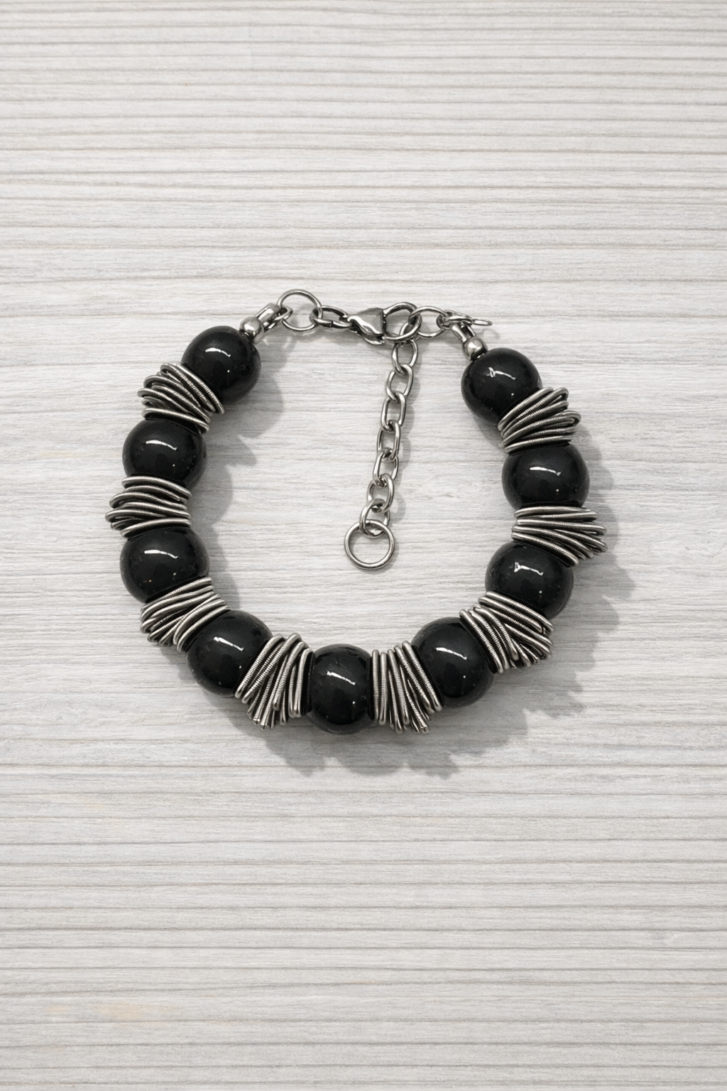 Braccialetto Ø12 bantù nero.PNG