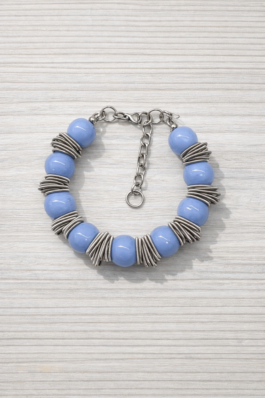 Braccialetto Ø12 bantù pervinca.PNG