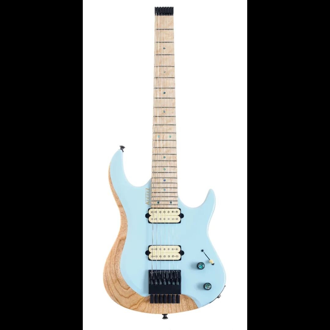 Just in time for spring and summer, this guitar has abalone, light blue paint, and &ldquo;sand&rdquo; colored woods to invoke thoughts of the beach!&nbsp; Don&rsquo;t let its summery theme fool you&hellip; it&rsquo;s a metal machine through and throu