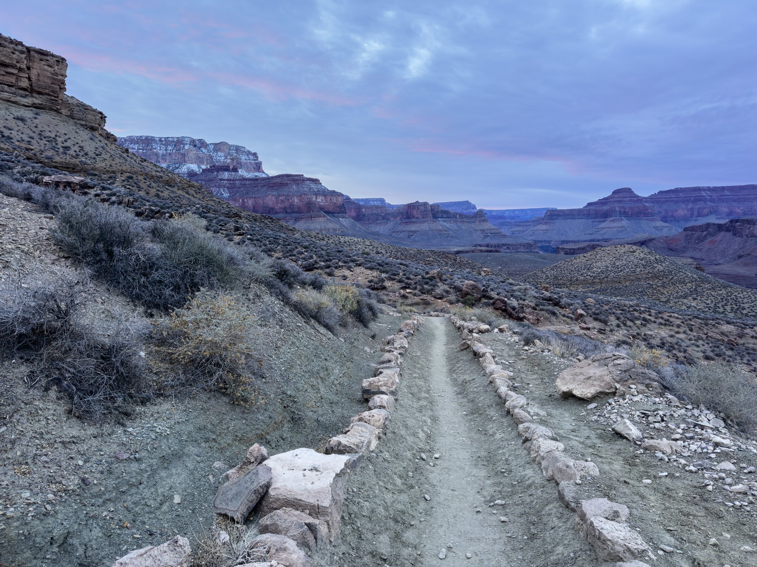 Going down into the canyon as the sun sets during a Rim-To-Rim trek (& back) of the Grand Canyon
Shot on iPhone 14 Pro