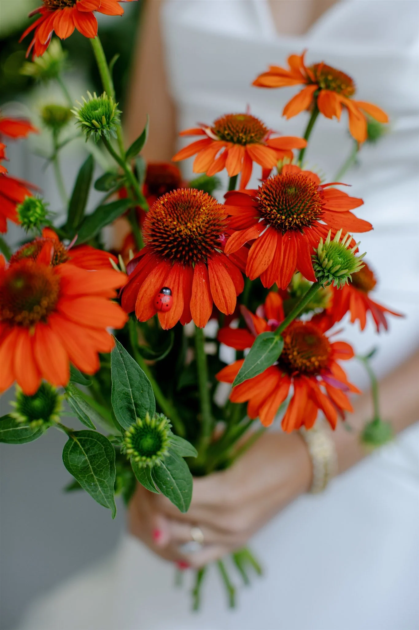 vibrant orange bridal bouquet ladybug new york wedding beth chapman styling