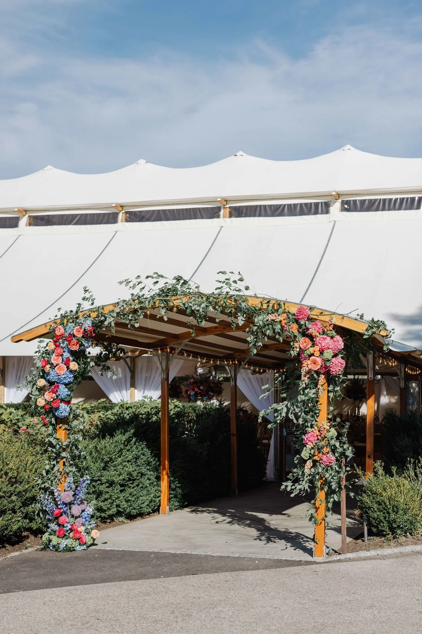 castle hill inn floral arch tent entry beth chapman styling