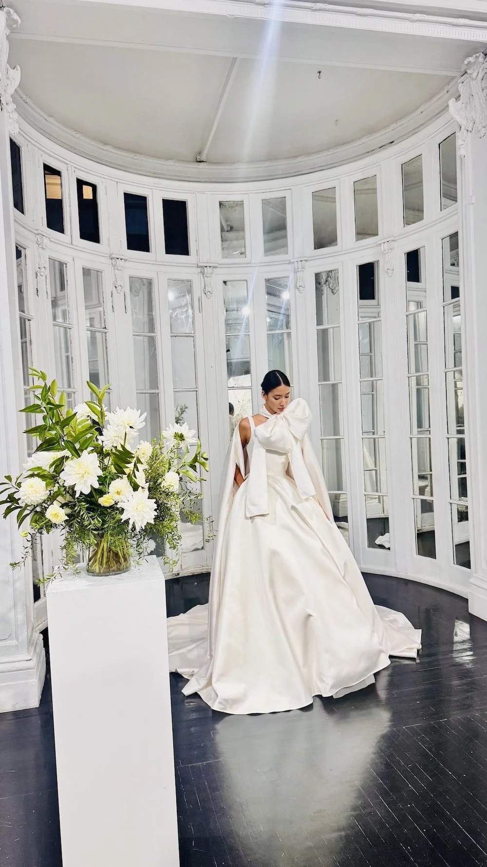 Dramatic wedding dress, oversized bow, cape from Fall 2026 New York Bridal Fashion Week, Beth Chapman Styling, Ines Di Santo