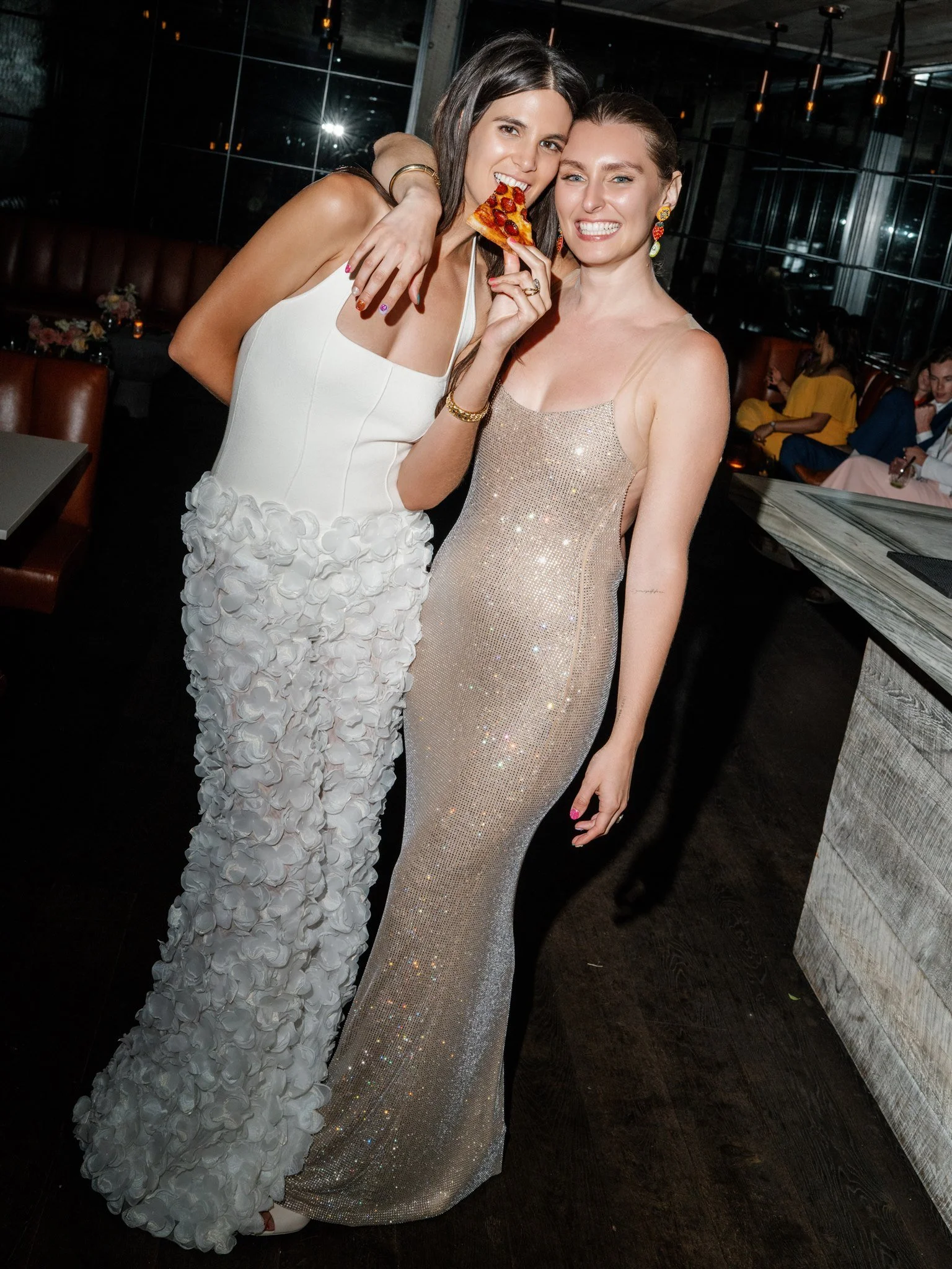 brides enjoying pizza sparkling reception dress beth chapman styling