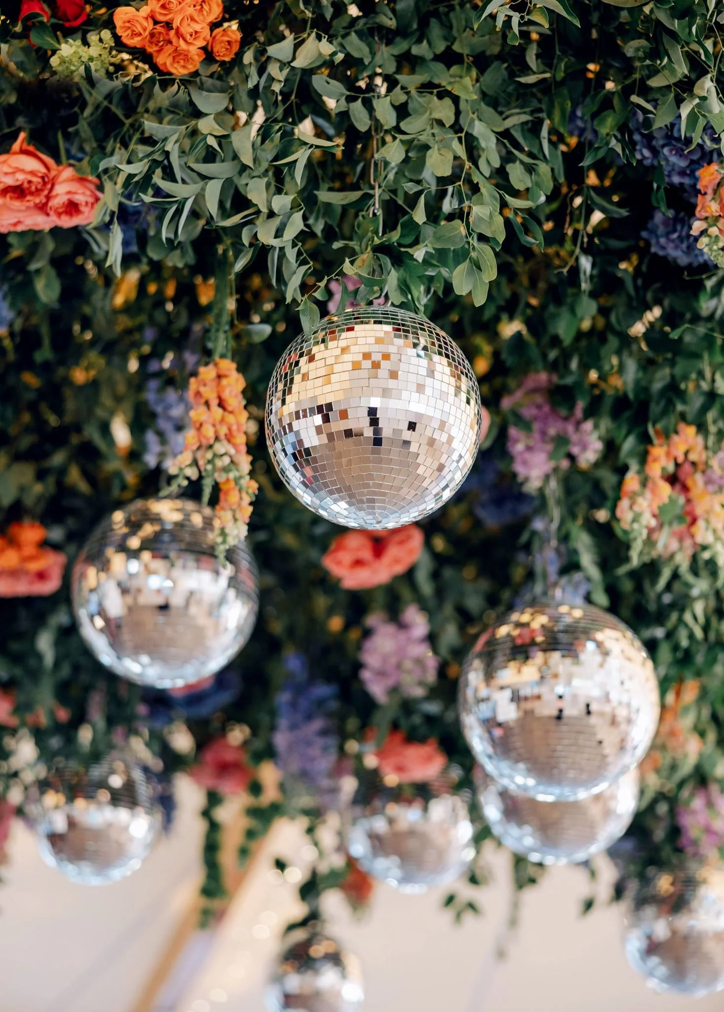 disco ball hanging floral installation wedding decor castle hill inn beth chapman styling