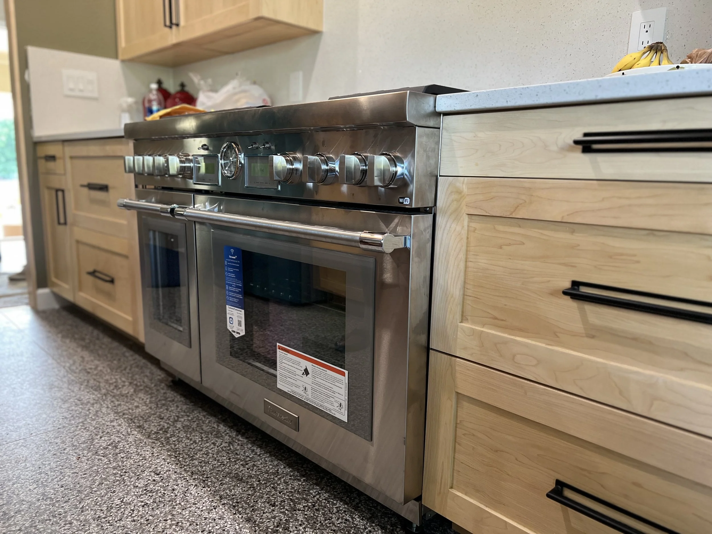 $30,000.00 stove with in a very custom maple Kitchen in Grand Junction.   Whatever you want, an expensive stove with pop up exhaust and custom cabinets.  It's yours.  Solveson Builders will bring it you!