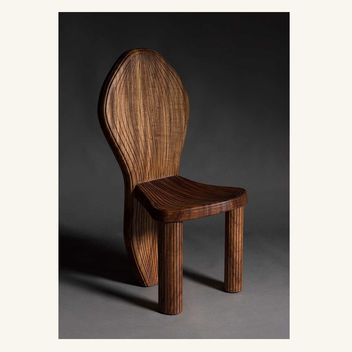 Object No. 24. The Stelae Chair, was designed and created as a companion dining chair for the Altar Dining table, as the Altar Table honors daily rituals. 

Meticulously crafted by skilled artisans its organic form is accentuated by the curved patter