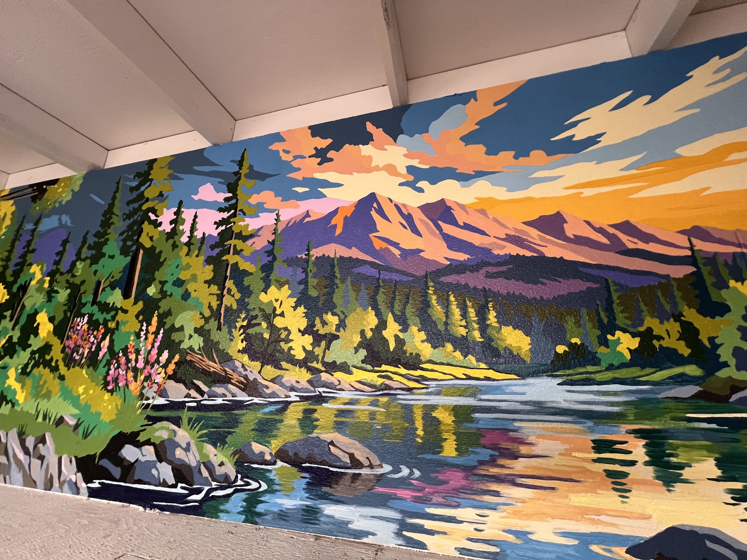 Mountain Scene portion of the 25' W X 4' H Great Blue Heron Mural at Leavenworth Quilt Co.