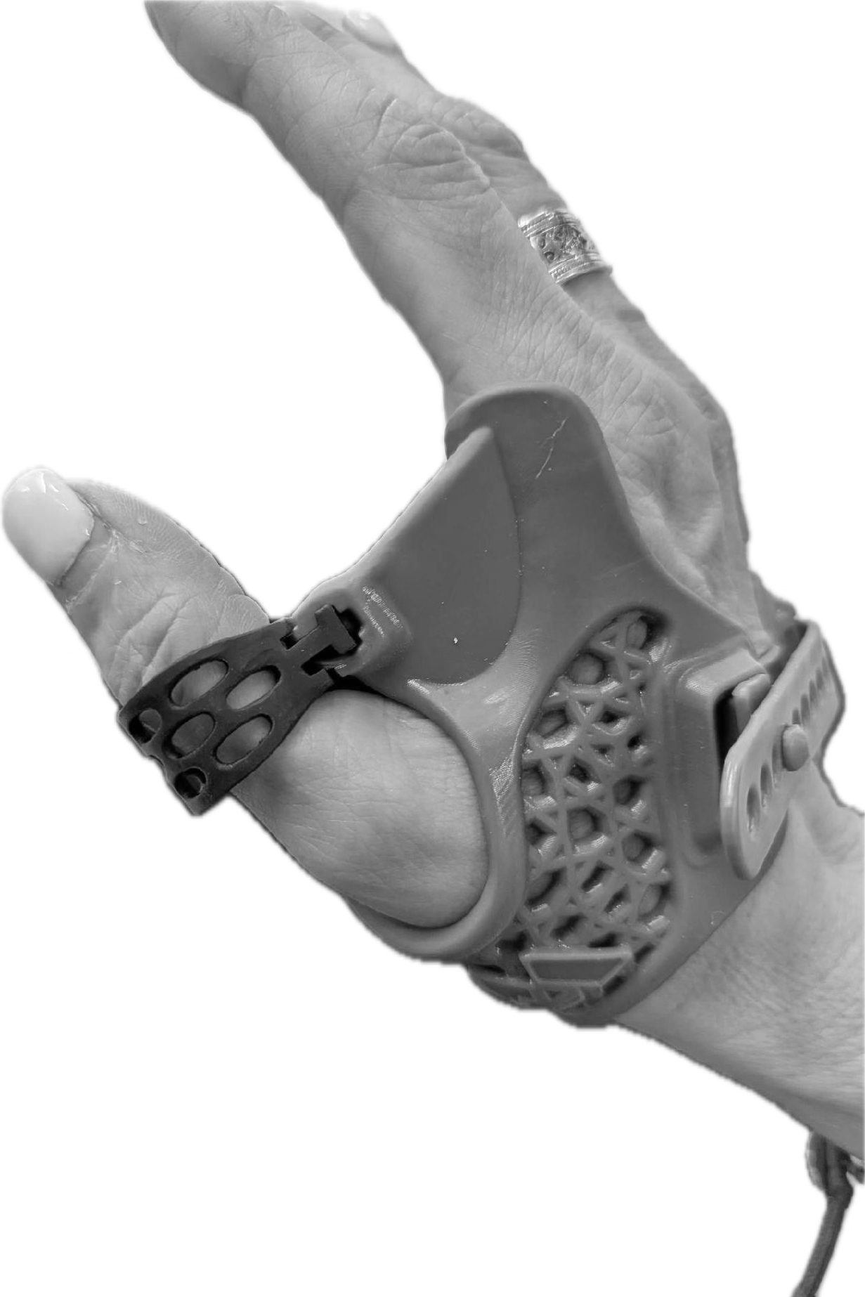 A hand wearing a medical respiratory mask with a valve and a ring on the finger, making a peace sign gesture.