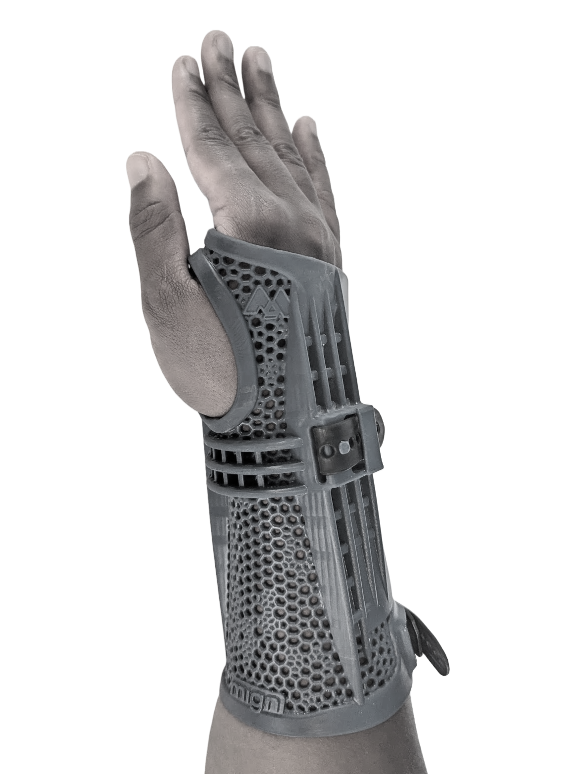 A human hand wearing a black wrist brace with a thumb opening and adjustable strap, raised vertically.