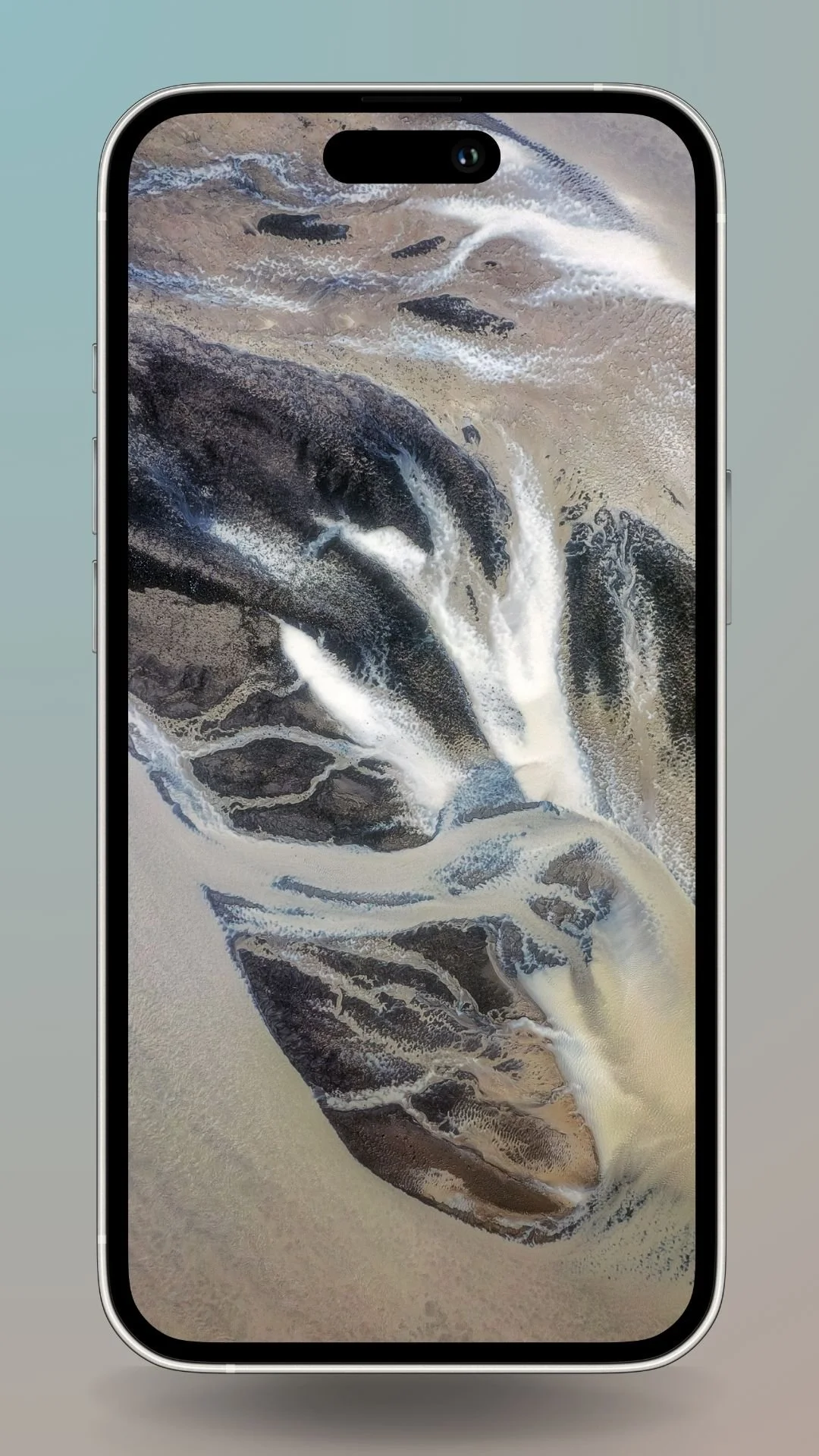 Aerial view of Icelandic landscape with brown river veins creating an abstract pattern. Downloadable as a smartphone wallpaper.