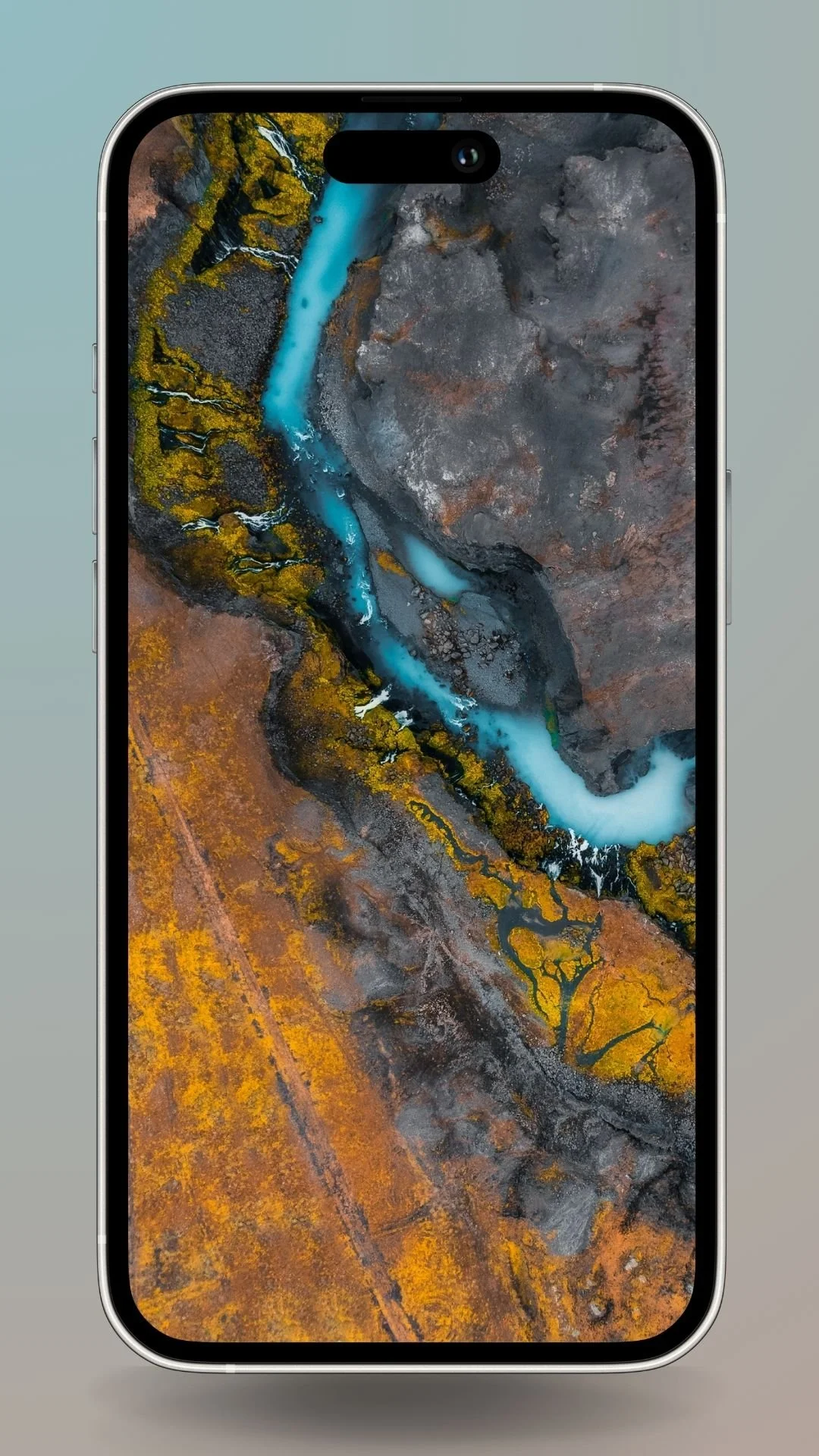 Dynamic Icelandic landscape featuring a winding river with turquoise water and rich orange terrain.