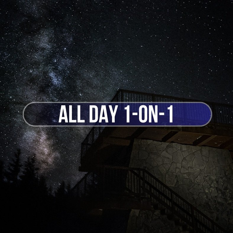 Night sky with stars and the Milky Way behind a wooden observation deck with a stone wall in the foreground. Overlaid text reads 'All Day 1-on-1'.
