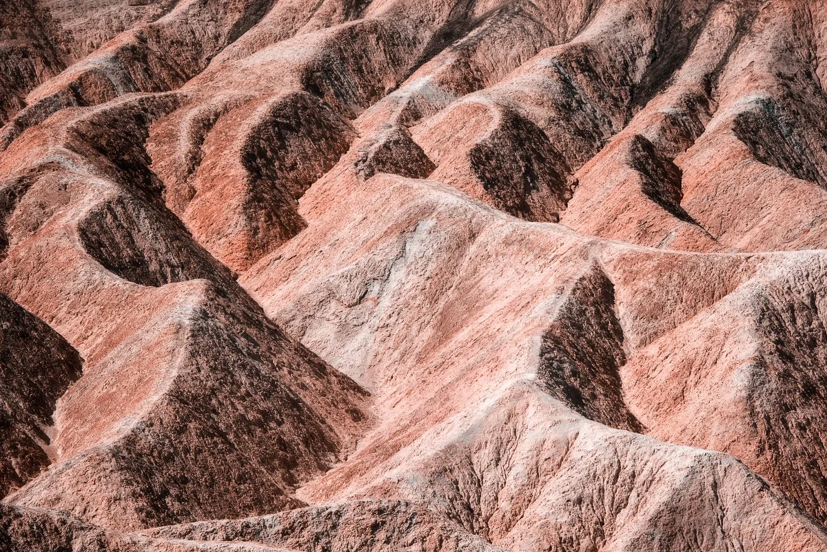Abstract Landscape in Death Valley, California: Eroded Rock Formations, Desert Terrain, Natural Earth Tones.
  Abstract, Intimate Landscapes  