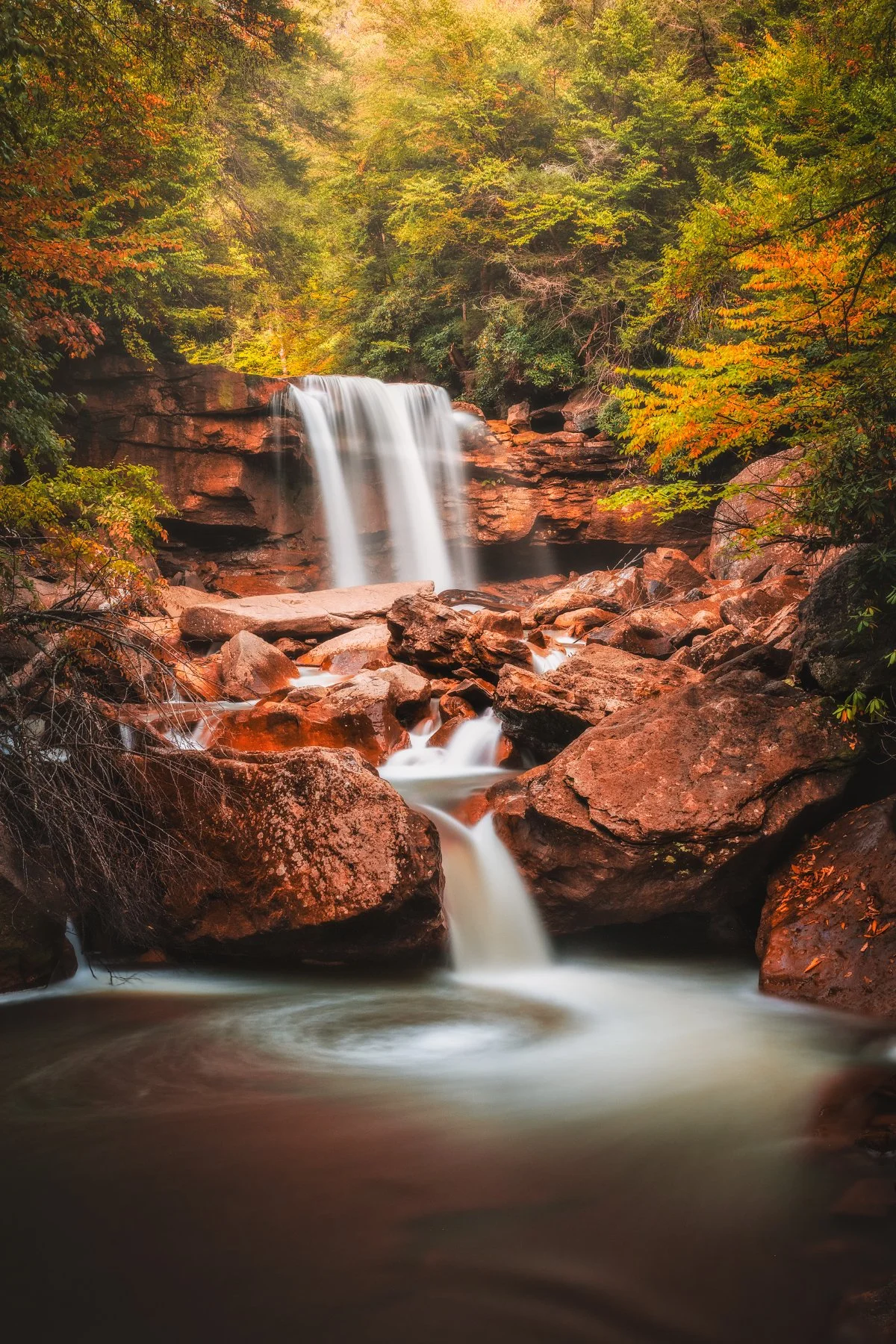 Douglas Falls, West Virginia: Stunning Waterfall, Autumn Colors, Scenic Beauty.
  Autumn, Waterfalls  