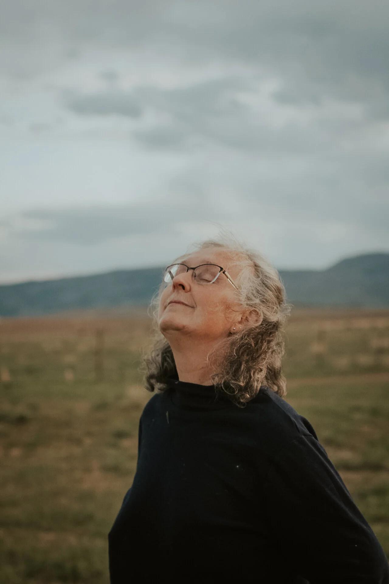 This is a recent photo of my mom in our backyard on my family's farm in Fort Collins. I think that her expression, combined with the color of the sky in the background, relates a sense of freedom. My goal with all of my photos is for them to convey s