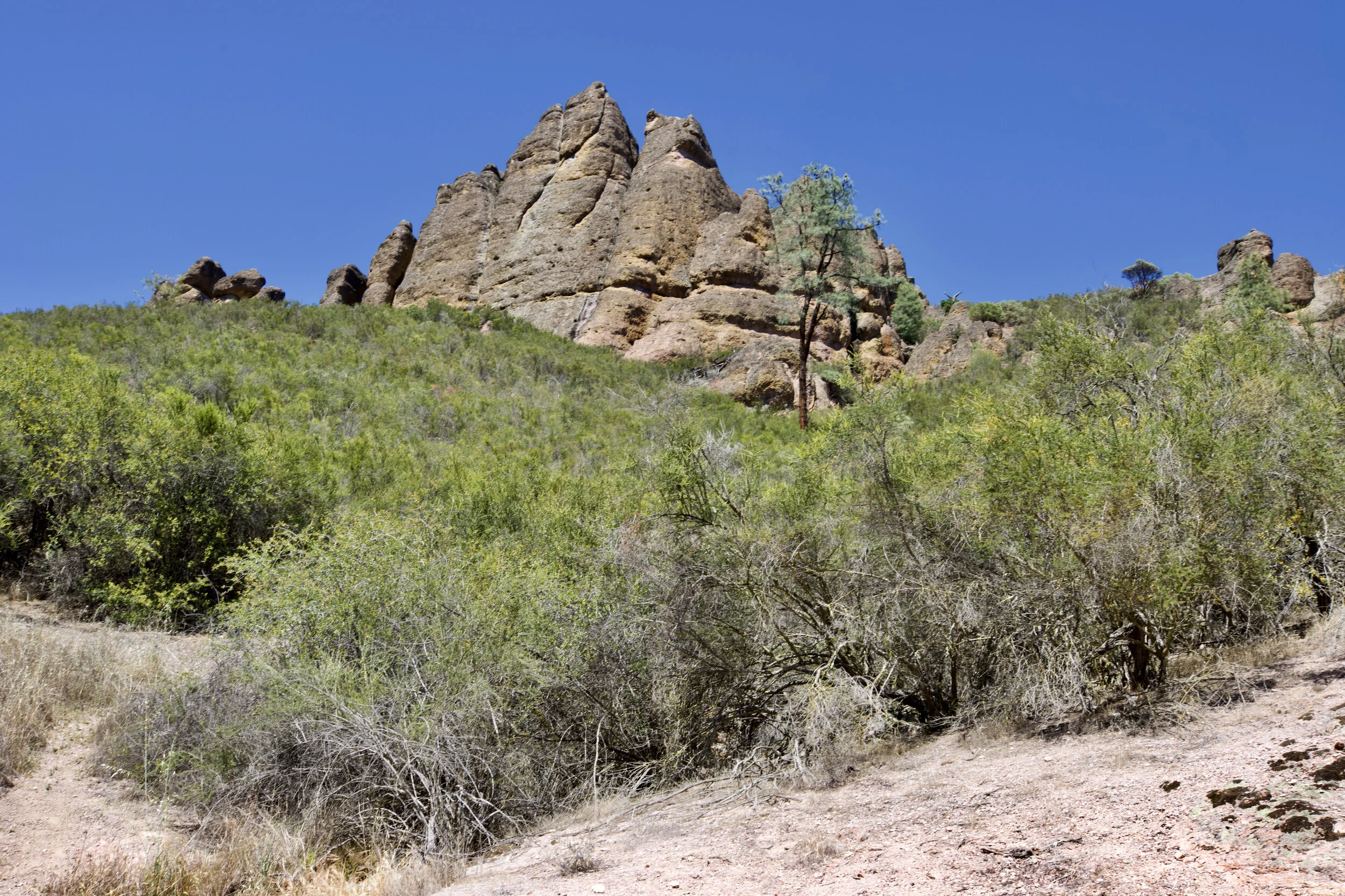 A beautiful rock formation against the blue sky in the background.