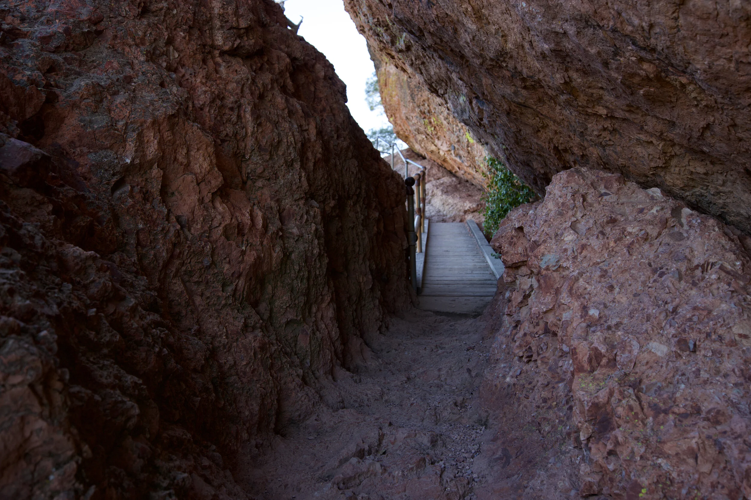 Small bridge built into the rocks to help travelers get across an opening.