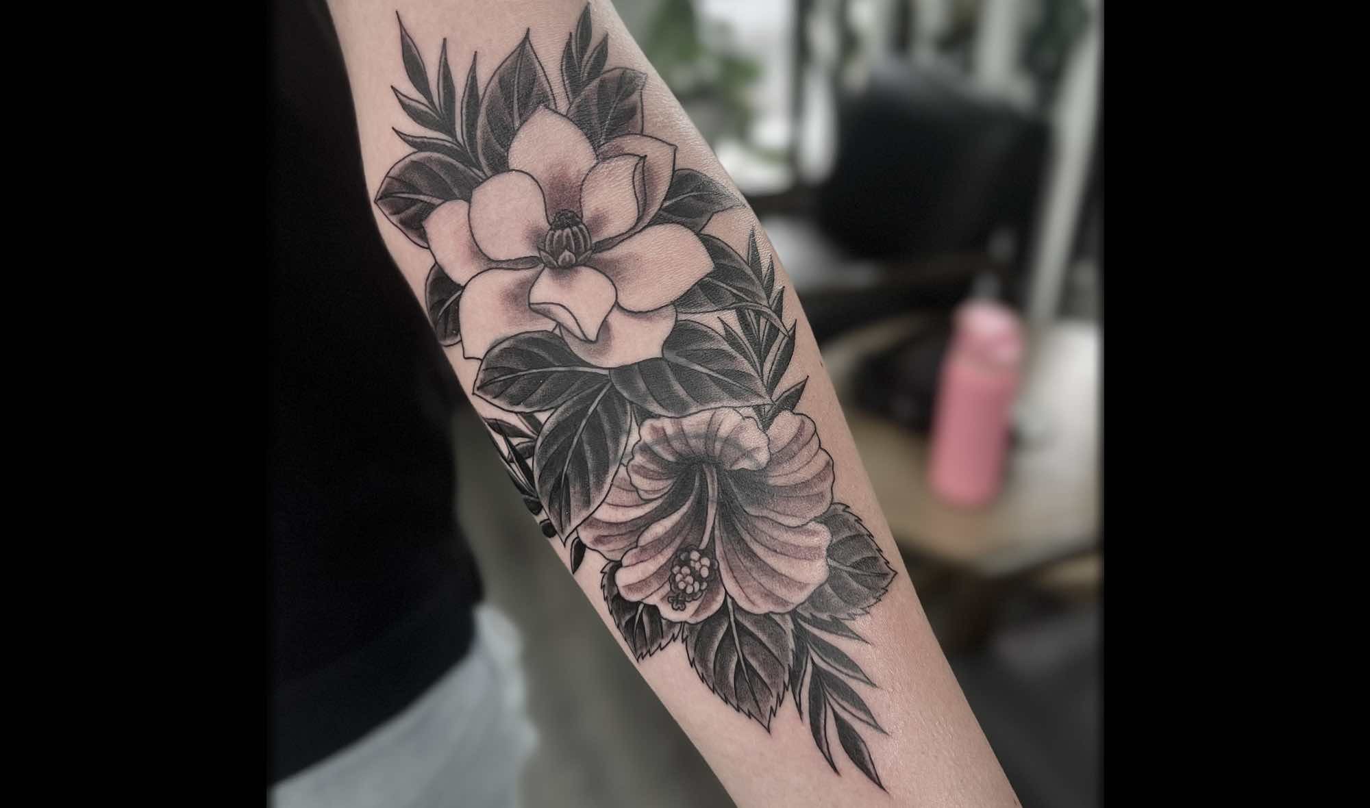 illustrative Magnolia cover-up tattoo, forearm placement, by Atlanta Tattoo Artist Wes Holland