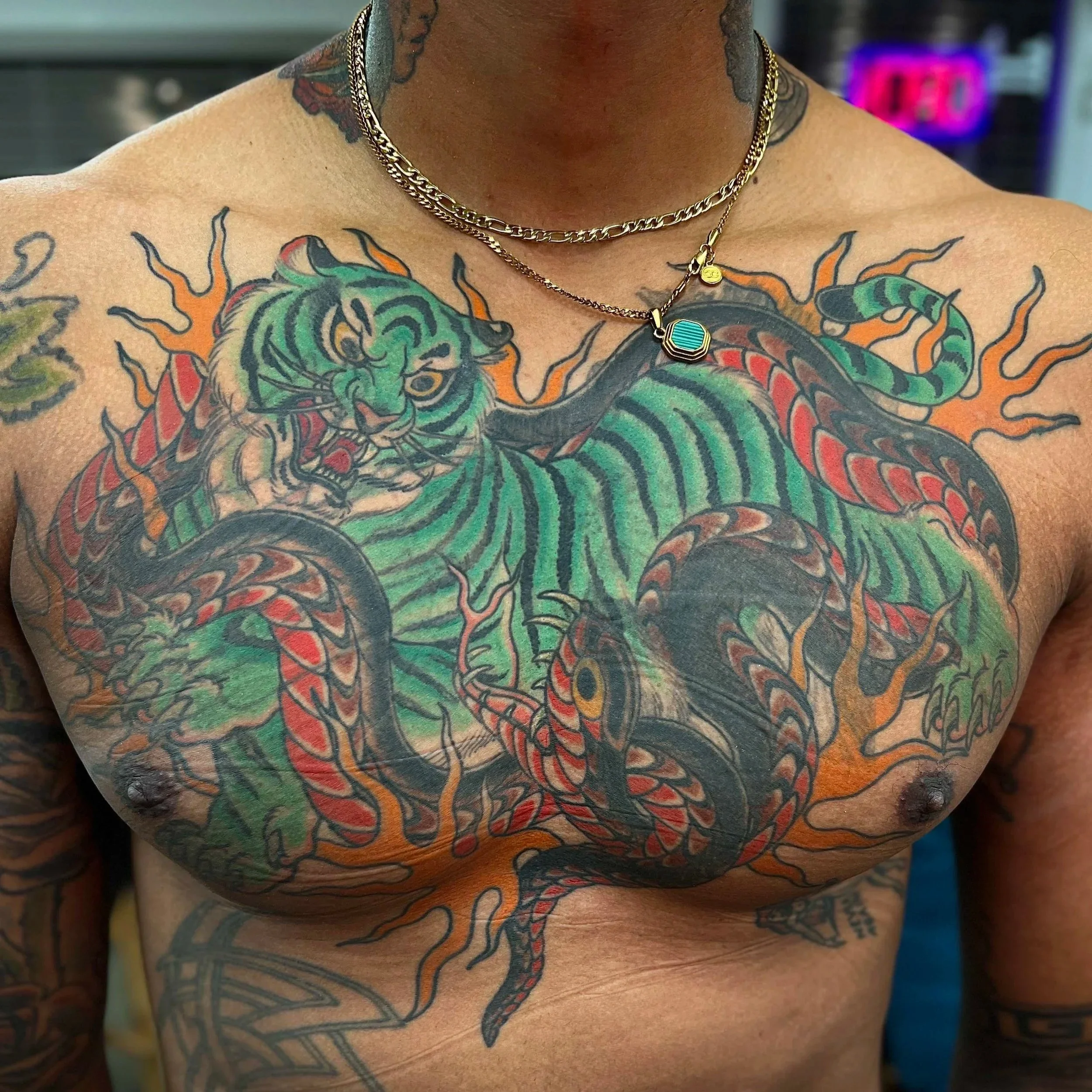 After: Japanese-style tiger and snake cover-up tattoo on forearm, lightwork tattoo in Metro Atlanta