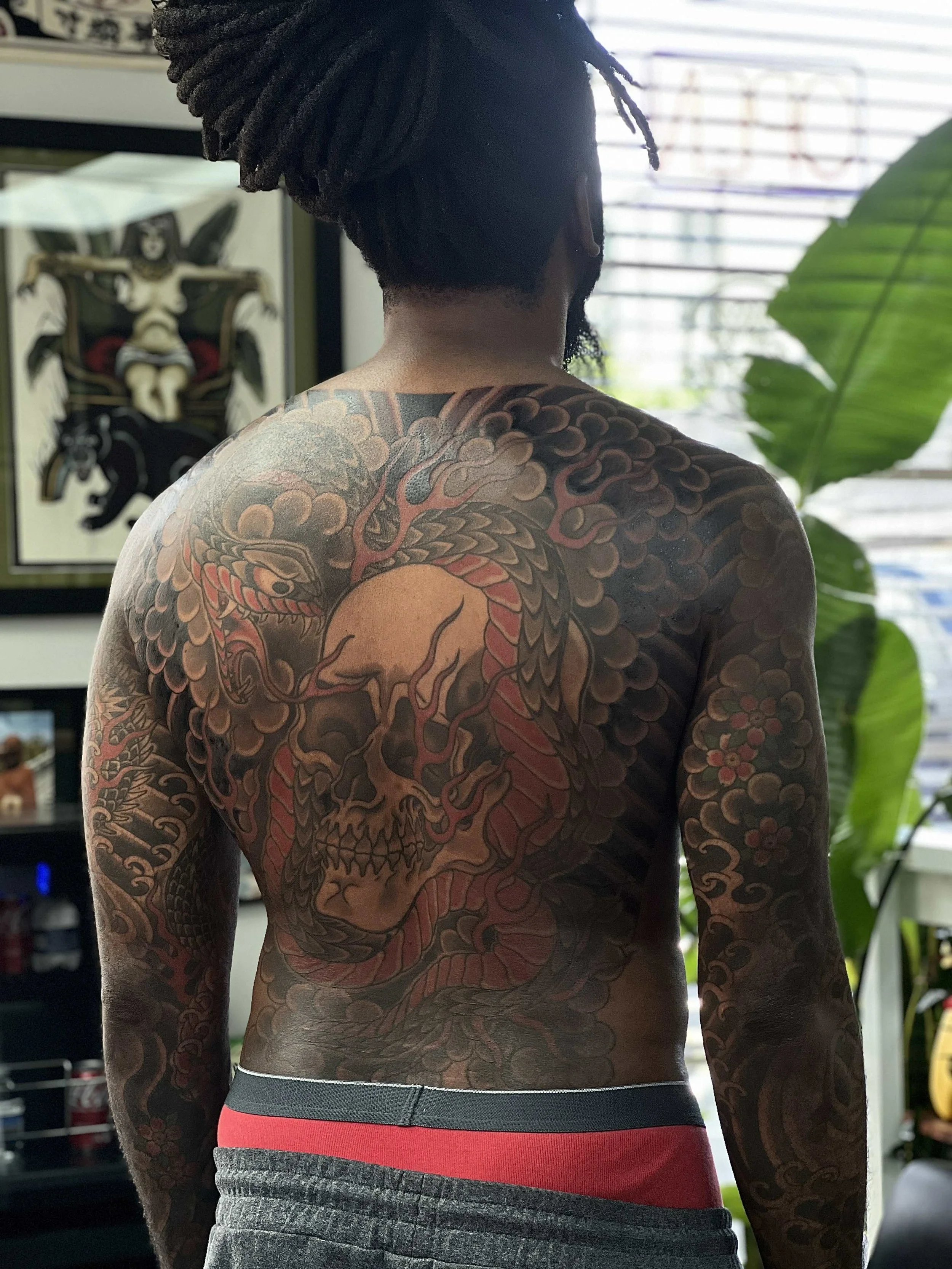 Healed Japanese backpiece on dark skin | Lightwork Tattoo Atlanta