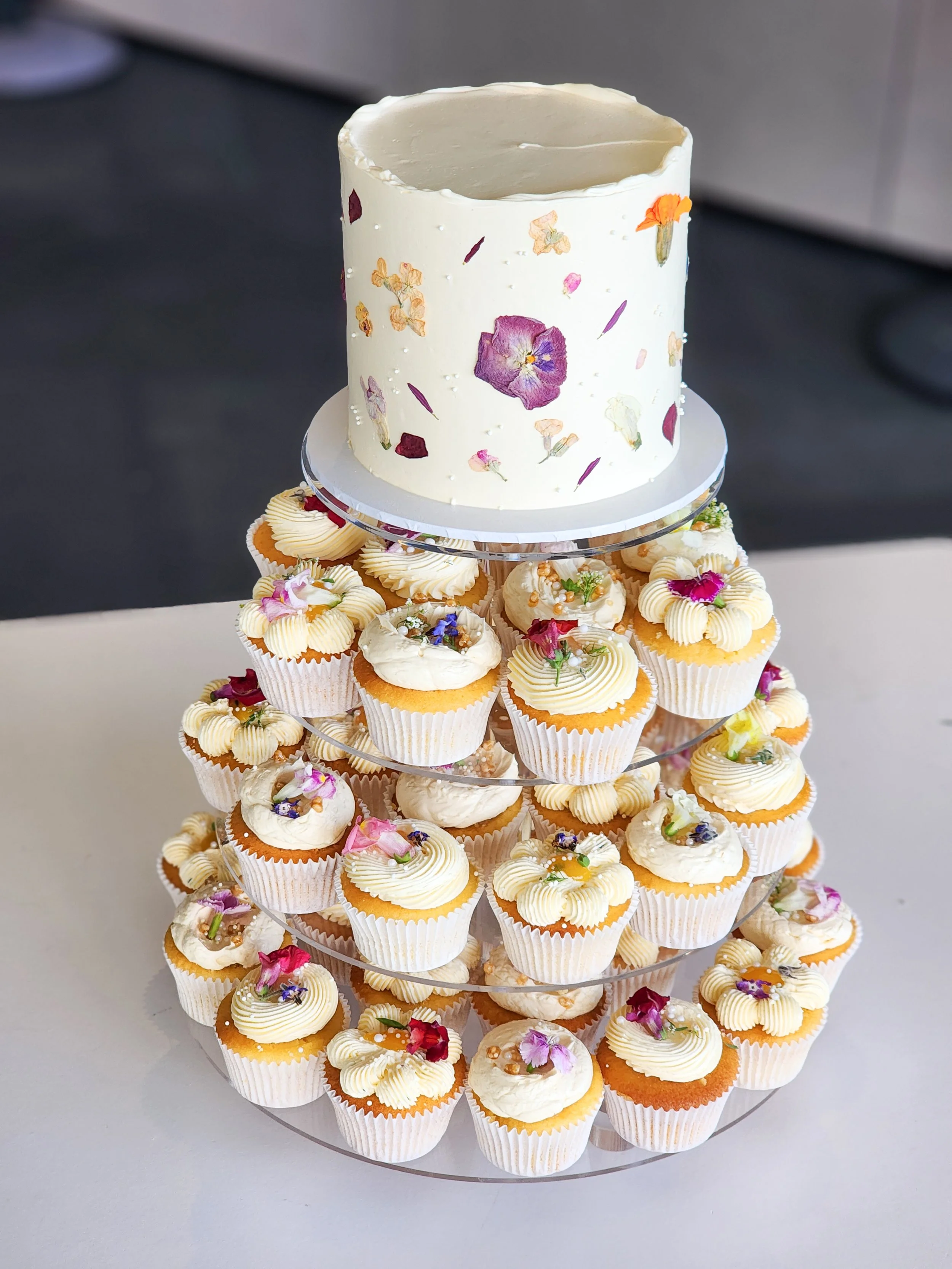 Newcastle wedding cake and cupcake tower with edible flowers