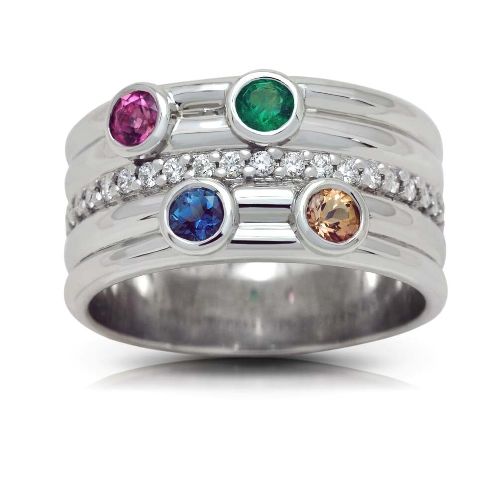 This custom-made family ring is studded with vibrant multi-coloured gemstones, highlighted by a trail of twinkling diamonds.⁠
.⁠
In the warmer months, I see crisp green grass, clear blue sky and summery blooms but now, with the holidays upon us, I sw