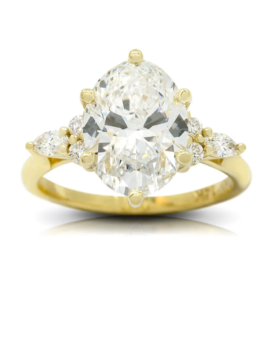 A 3‑carat oval‑cut diamond commands attention in this custom design, poised above round and marquise accents in a six‑claw, high‑polish setting that elevates its brilliance.⁠
.⁠
.⁠
.⁠
.⁠
.⁠
#engagementring #ovalcut #shesaidyes #customjewellery #ovalc