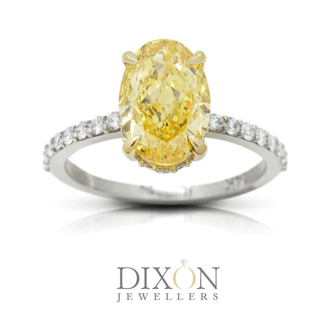 Oval Yellow Diamond Engagement Ring.jpg