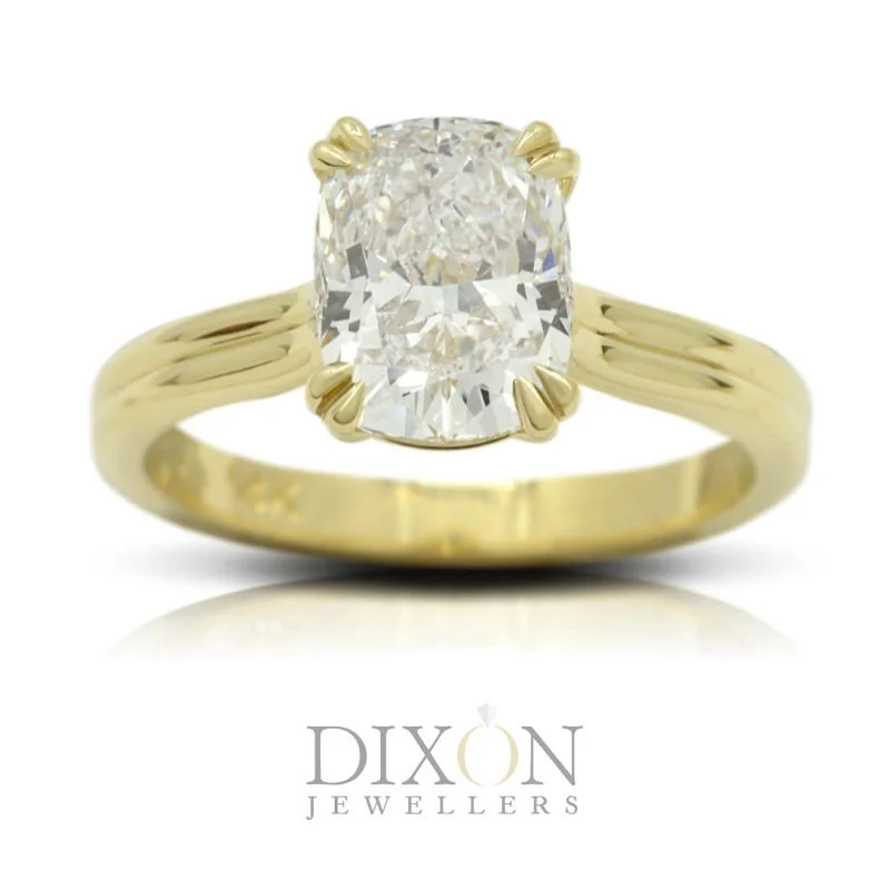 Custom Elongated Cushion with Double Claw Detail Engagement Ring.jpg