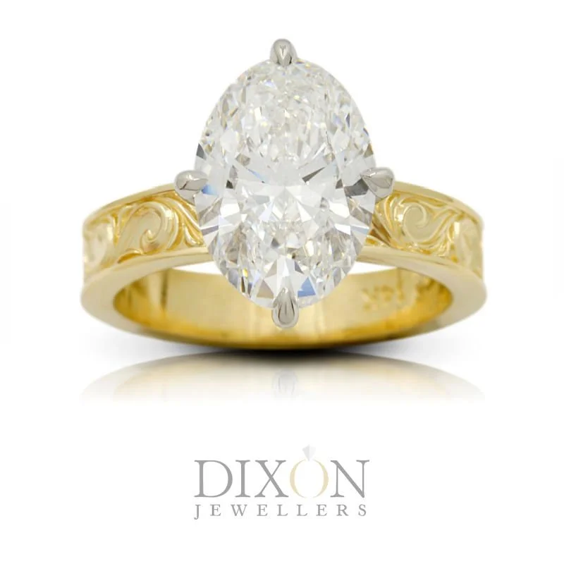 Custom Wide Engraved Band Oval Cut Diamond Engagement Ring.jpg