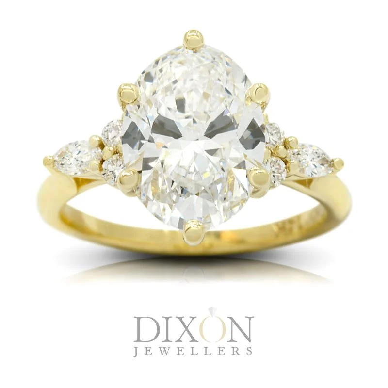 Custom Six-Claw Set Oval Diamond Engagement Ring with Marquise Accents.jpg