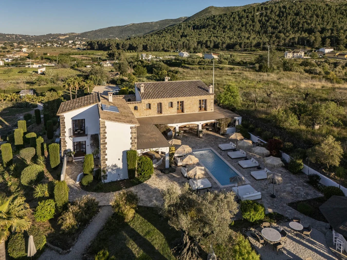 close up of building with swimming pool and gardens
