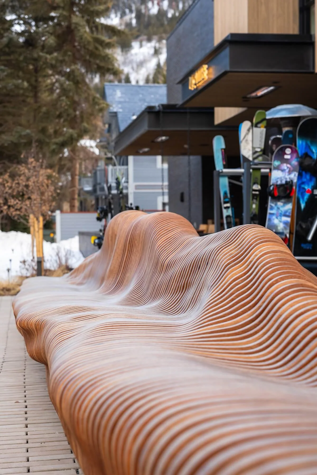 Undulating custom fabricated bench outside of the Mollie Hotel in Aspen.