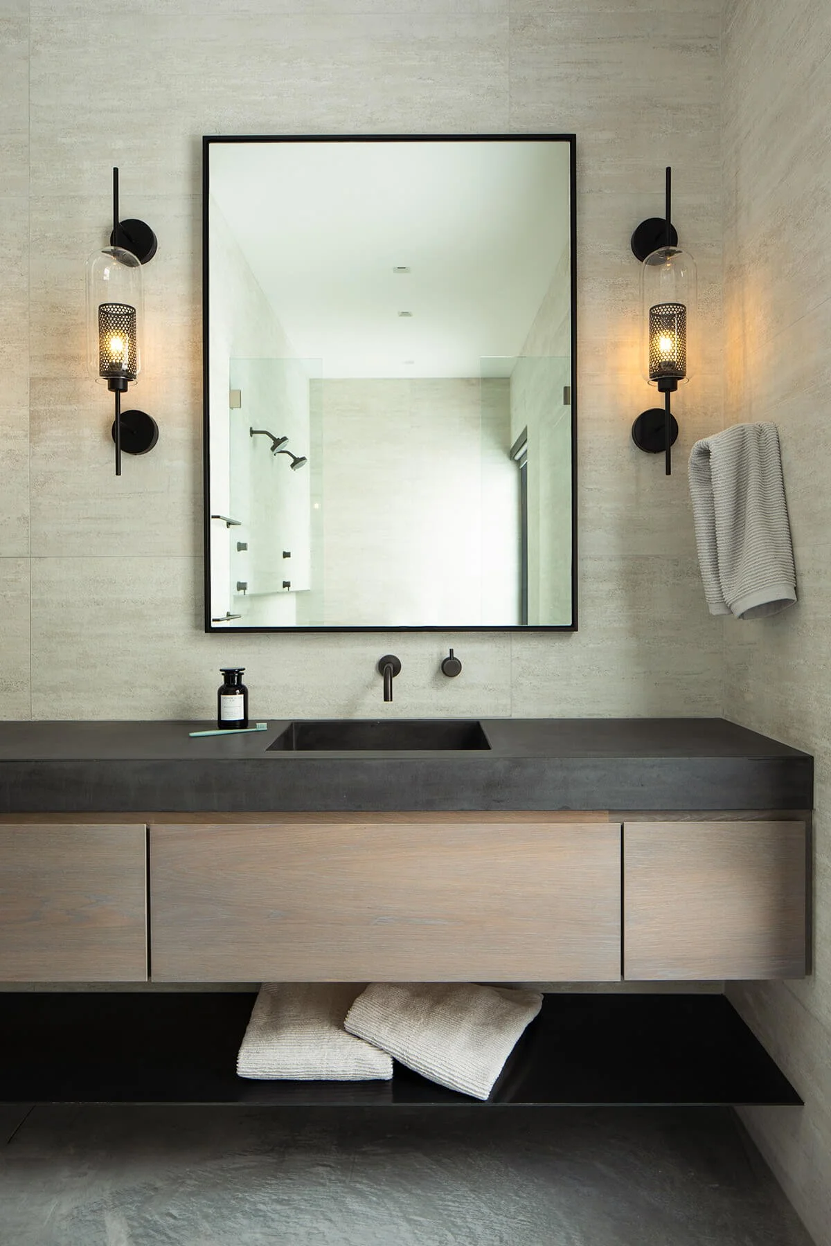 Dark grey concrete vanity in a modern home in Jackson Hole Wyoming.