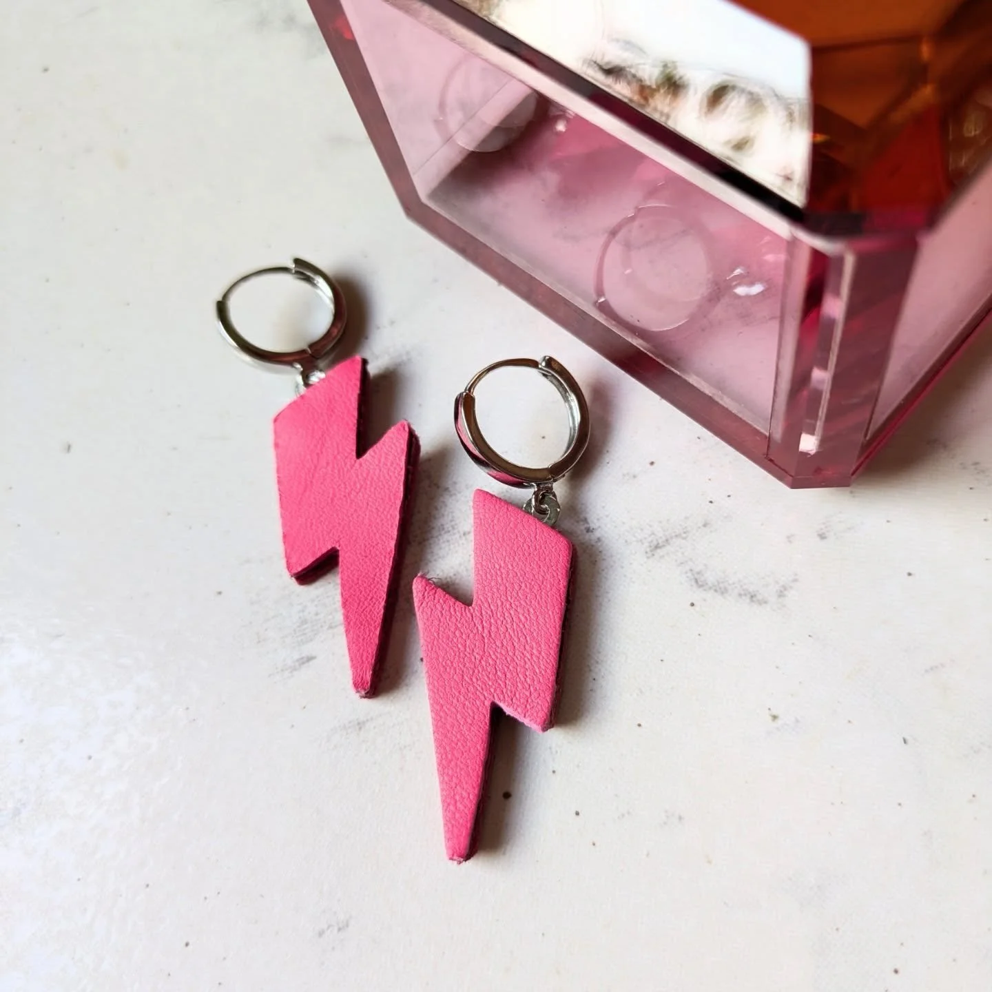 Lightning hoops and new disco necklaces are fresh on the website. 
The bolts as usual are double sided and creole hoops have a lever back clip clasp and can be worn backwards to show off the reverse colour. All details on my website.
The necklaces