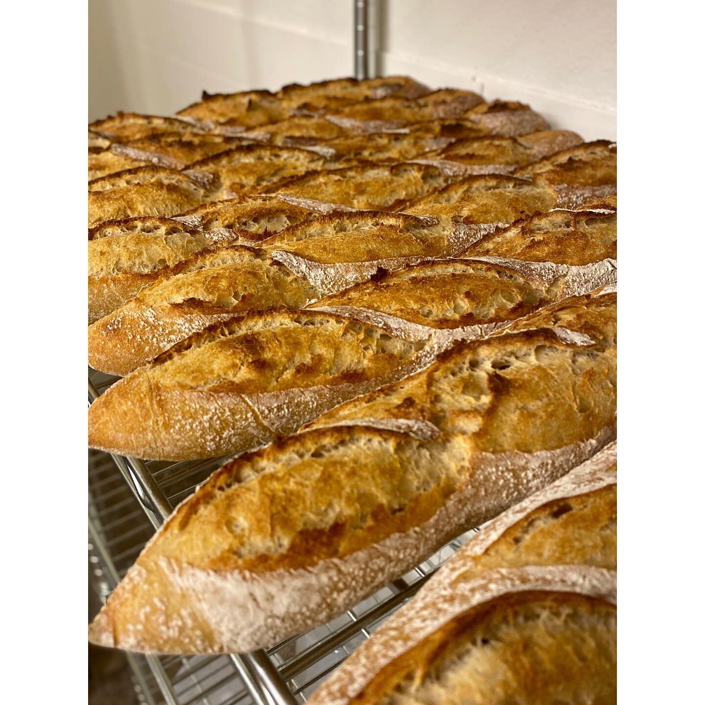 Hey look at that! A bunch of bread you can buy to eat! Baguettes, Babka, Loaves stuffed with Roasted Garlic with Cheddar and Herbs, Olive fougasse, Rouge de Bordeaux Country Loaves from @bartonspringsmill and Sesame Durum Epis from @roaringfork_mill 
