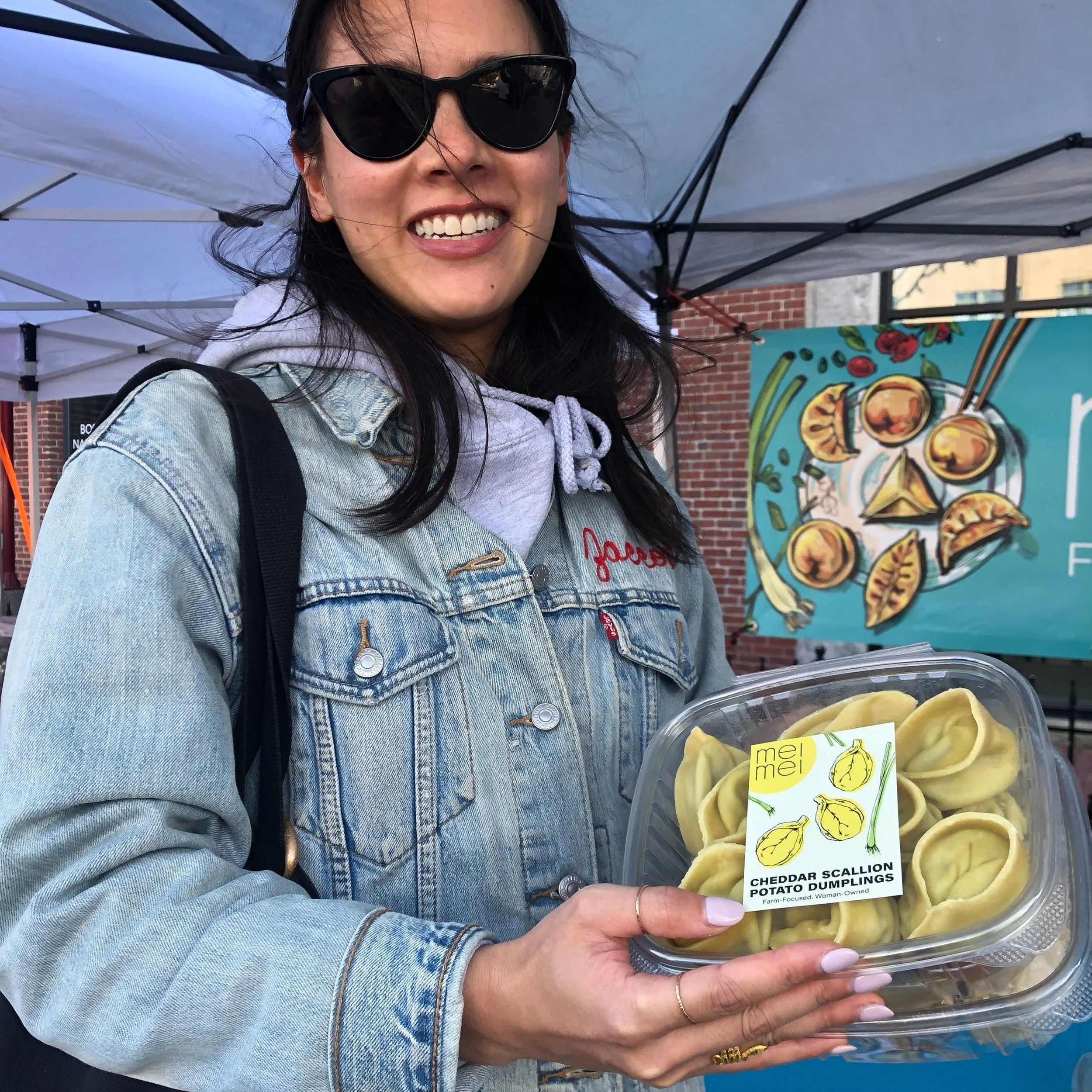 Mei Mei customer purchasing dumplings