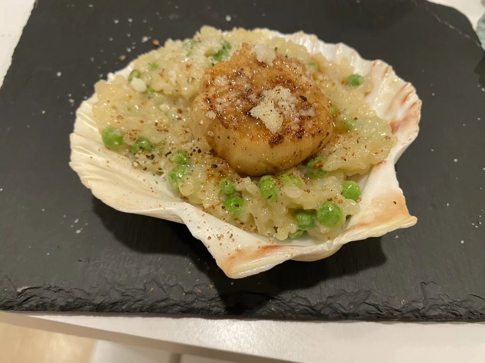 Seared scallop on the half shell