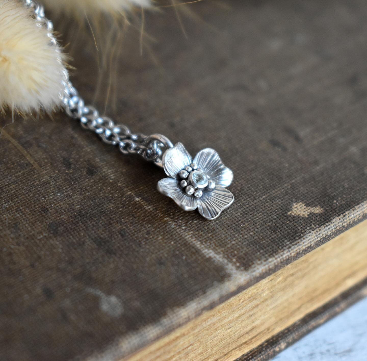 I&rsquo;ve been focusing a lot lately on this line of flower blossom pendants. In fact I&rsquo;ve been driving myself batty trying to &ldquo;perfect&rdquo; the looks of them in both solid silver and wax for molding. My brain never seems to run out of