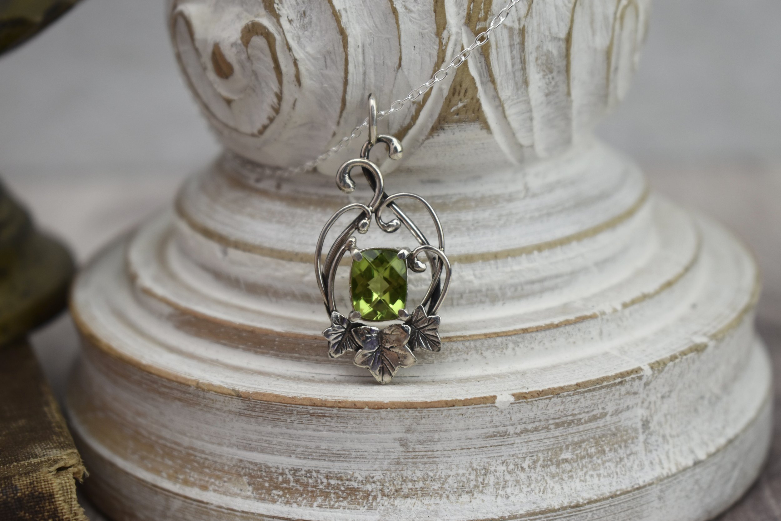 ivy leaves sterling silver necklace with curling vines and peridot gemstone