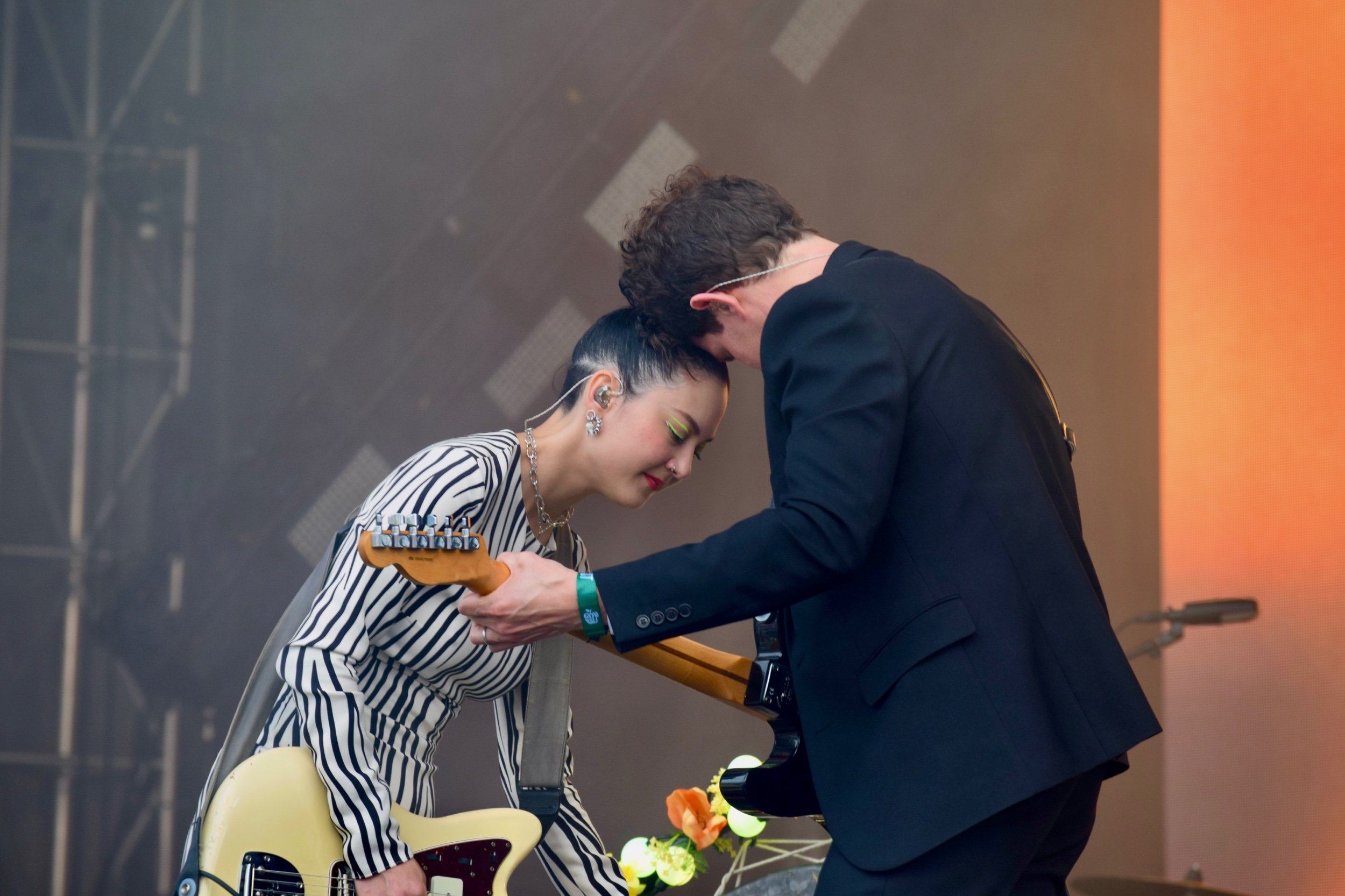  Michelle Zauner and her husband/bandmate Peter Bradley share a tender moment at the end of their set. 