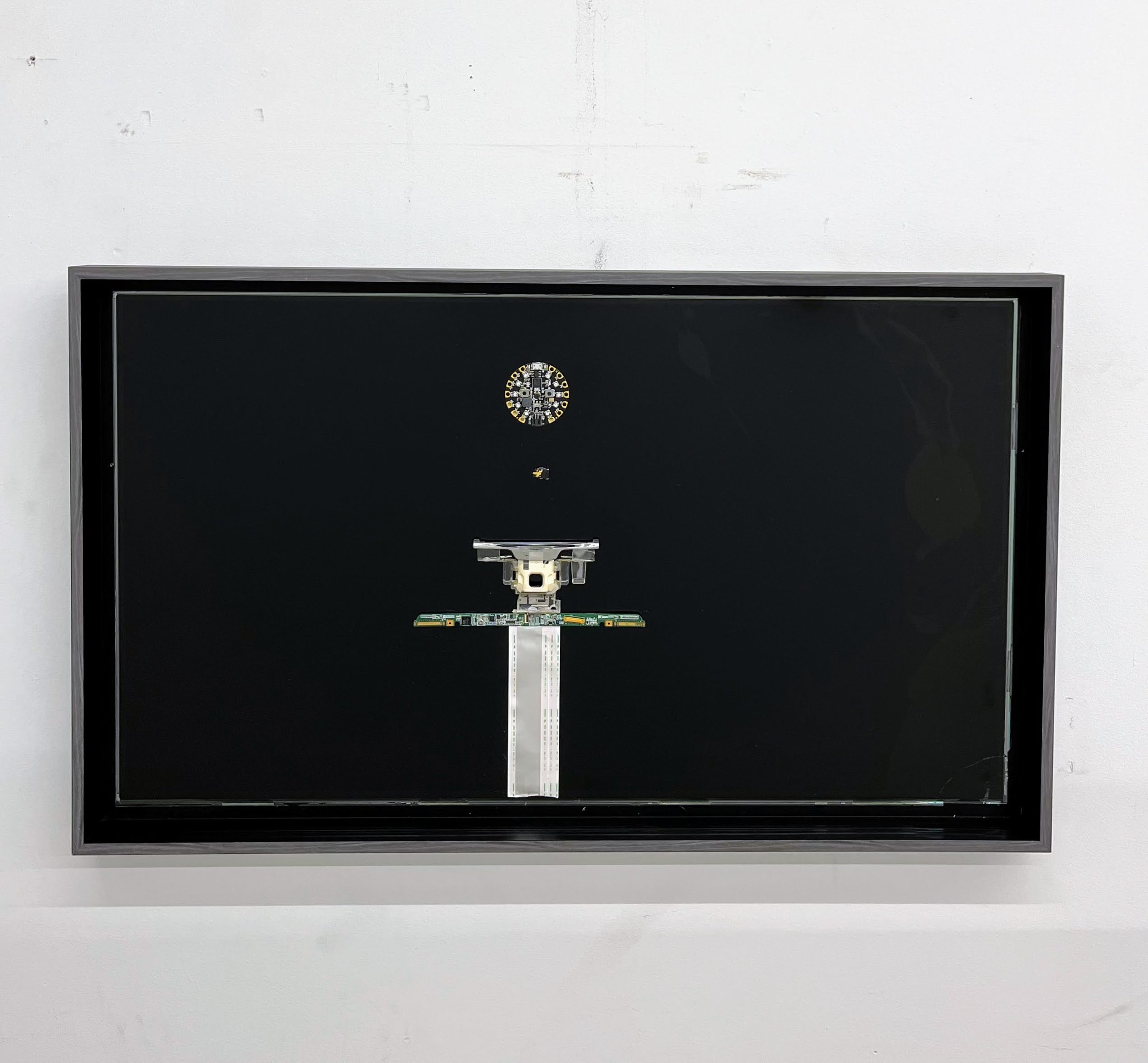 The Redeemer, 2022 Television Screen, Circuit Board, Circuit Chip, USB, Various Television Components 27 x 48 x 4 in. (framed) 68.58 x 121.92 x 10.16 cm (framed)