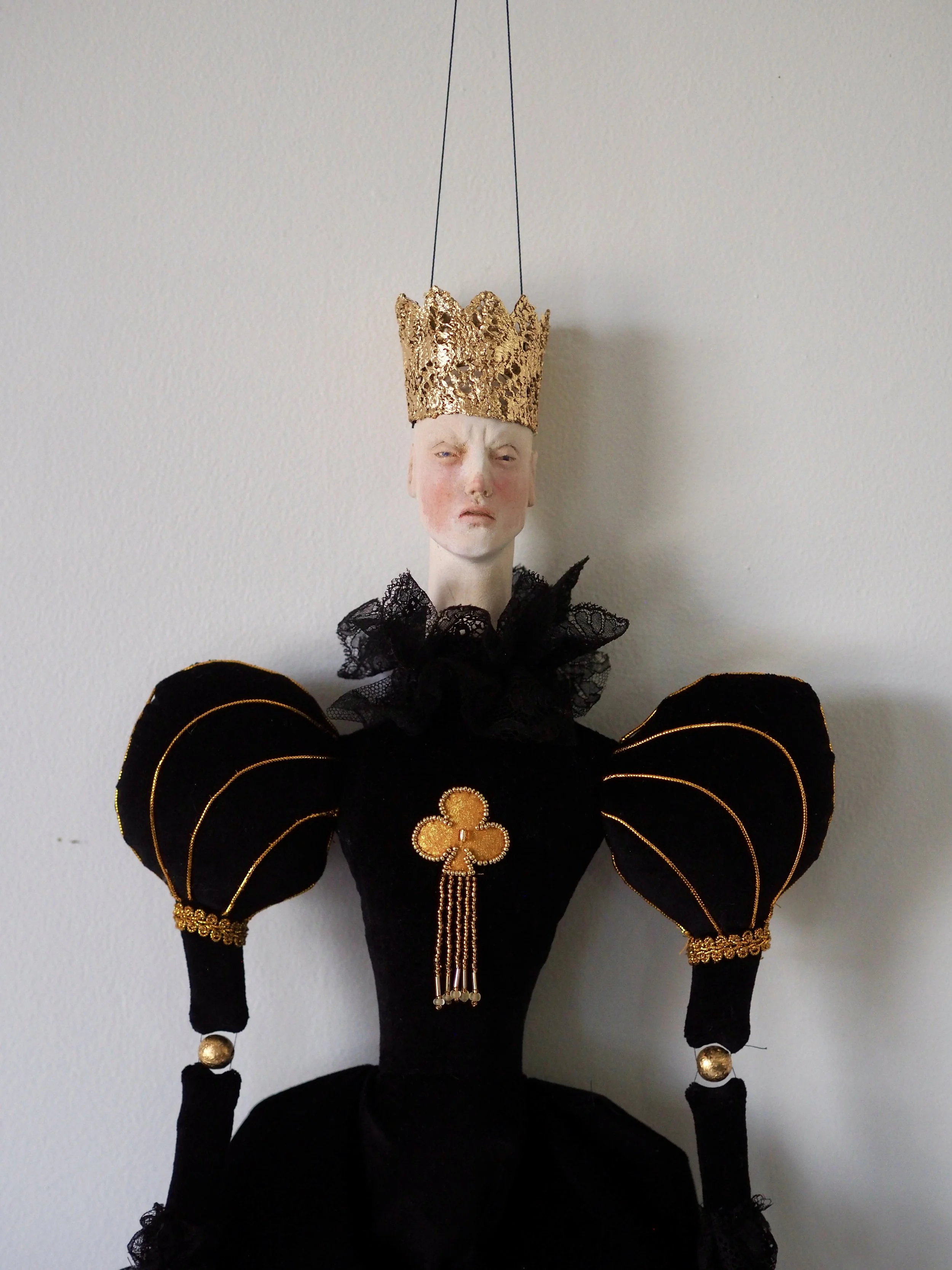 The king of Clubs, wood & textiles, 2026