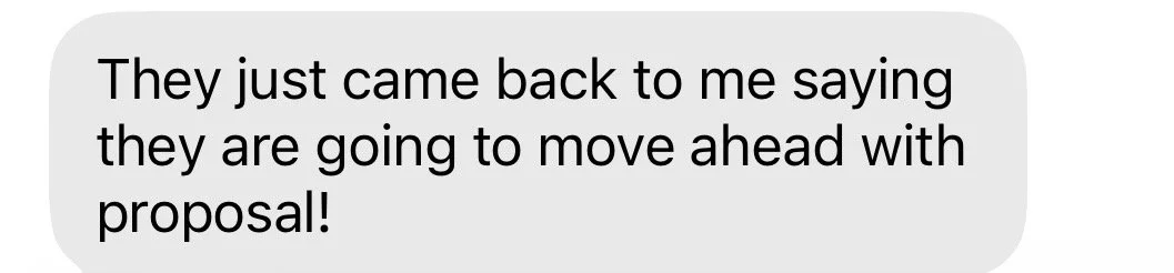 Screenshot of a text message saying, 'They just came back to me saying they are going to move ahead with proposal!'