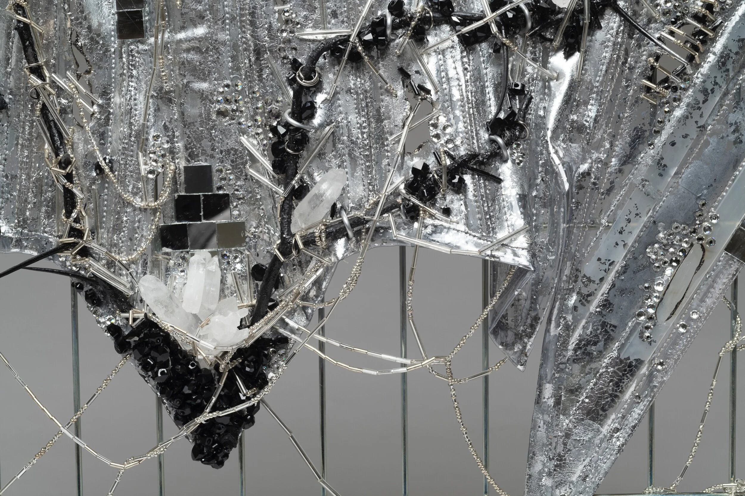 ‘Mending’                                                          2018Photos by: James PrinzThis was made while taking Shaping Of The Female Form at the School of the Art Institute of Chicago. This corset canvas represents self  and the process and progress of mending  and growth through all the storms of life.  The concept and materials used represent transparency, pain, healing/mending, self-love &amp; reflection. Your wounds will ALWAYS heal -  just give yourself a chance to! Everyone has wounds and that’s what makes us BEAUTIFUL! My work was chosen to be featured in the Exhibition Guide for SAIC Fashion 2019. Also chosen to be a part of the SAIC Fashion 2019 Body-Builder Exhibition. I used metal cage, vinyl, thorns, plastic, spray paint, silver leaf, bugle and seed beads, Swarovski crystals &amp; beads, rock crystals, mirrors, jump rings, wire, thread and glue.