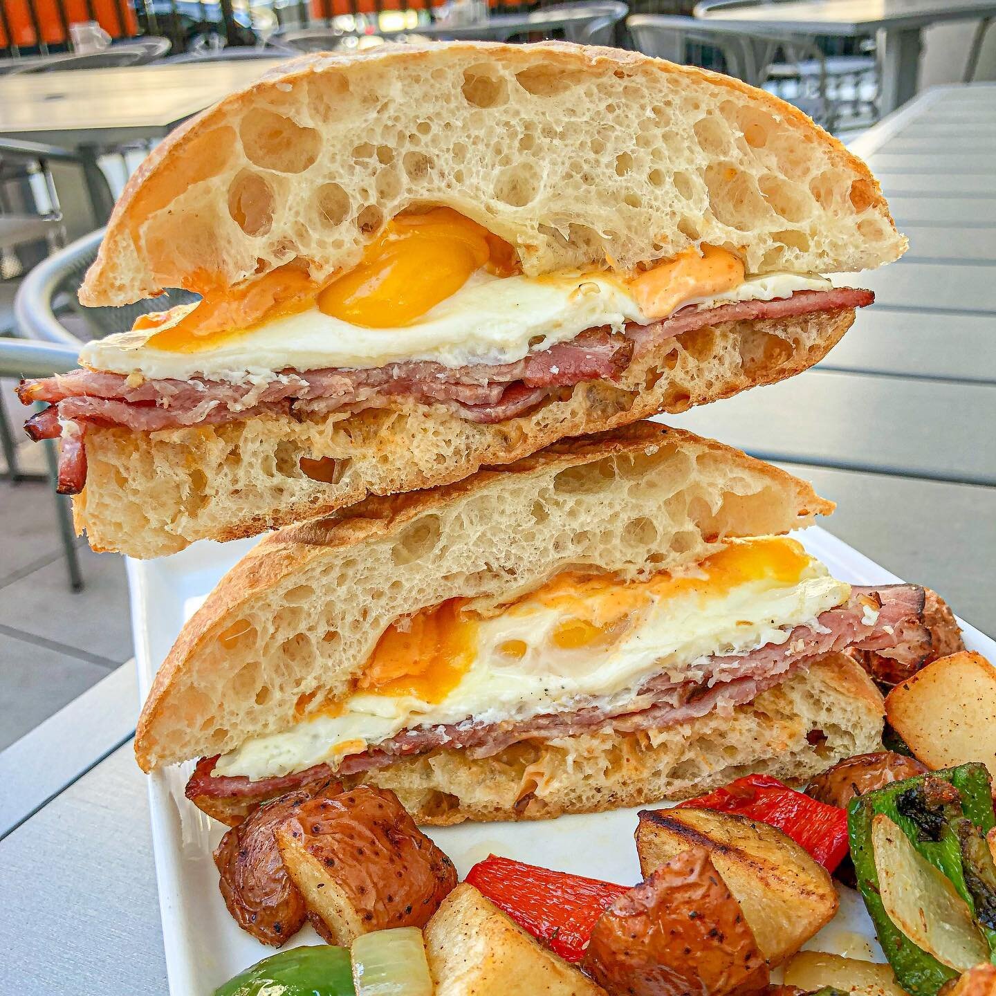 Pancakes aren't the only thing we're stacking 😉 This is our delicious Sriracha egg sandwich! Come and get it at our Little Italy and Milwaukee locations!
