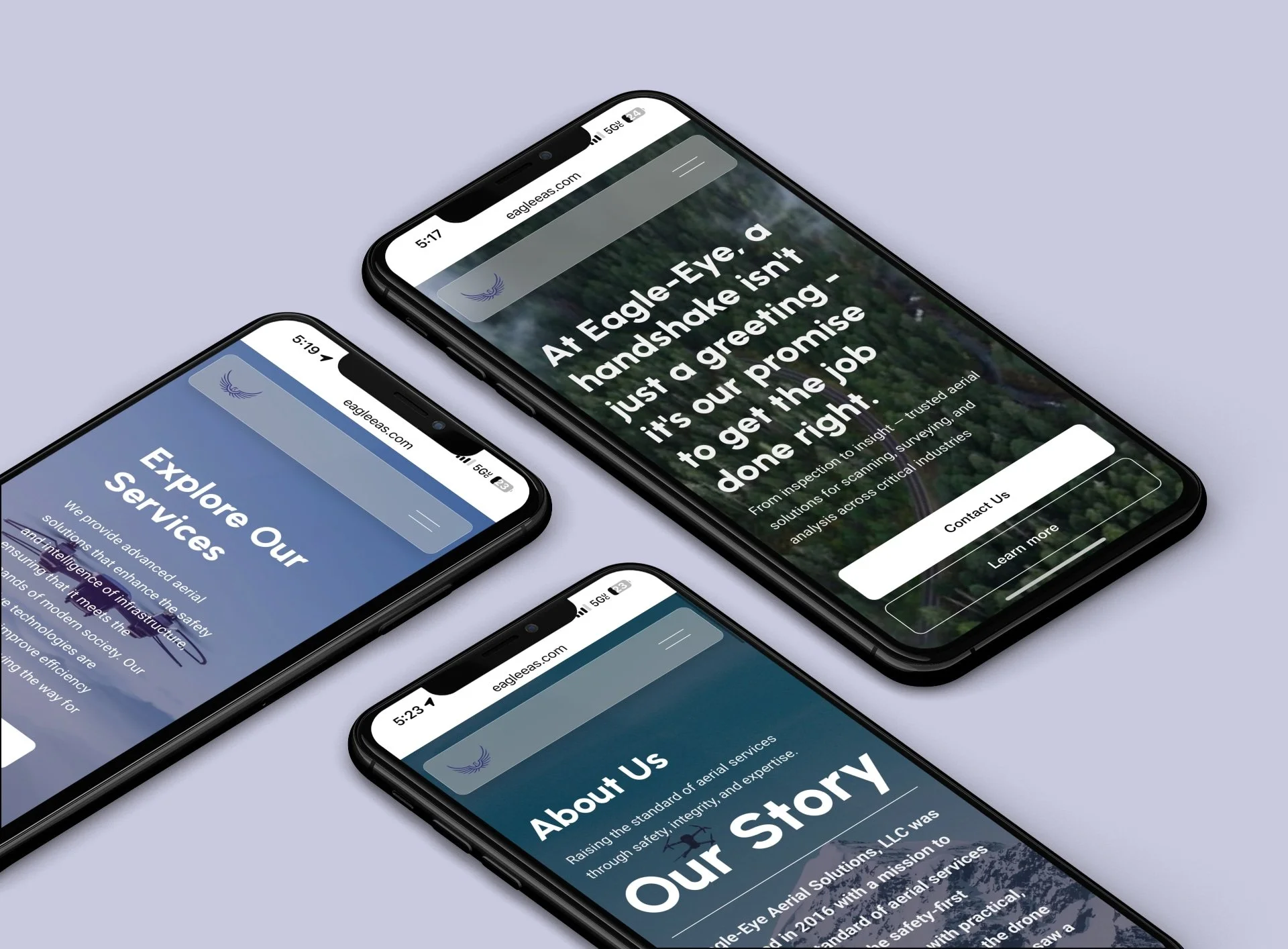 Three smartphones displaying a website about Eagle-Eye aerial services, with text about inspection solutions and company history, on a light purple surface.