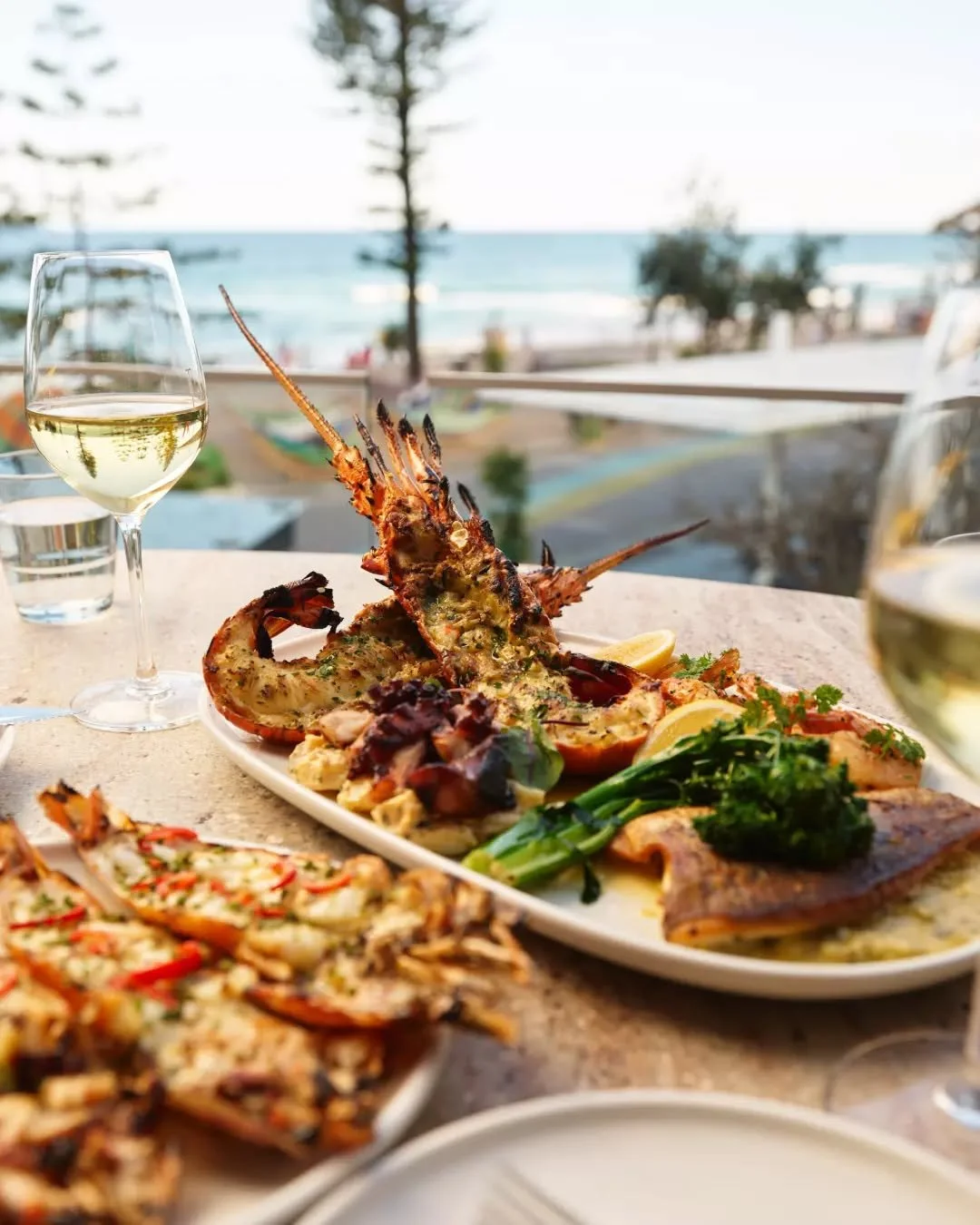 Summer and seafood just go together ⭐ and our fully-loaded Seafood Platter is the way to do seafood in style. With whole grilled lobster 🦞, grilled king prawns 🦐, garlic prawns, grilled octopus, salt and pepper calamari 🦑 and fish of the day serve